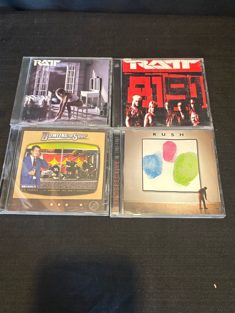 LOT OF 4 rock CDs: RATT, RUSH & BOWLING FOR SOUP